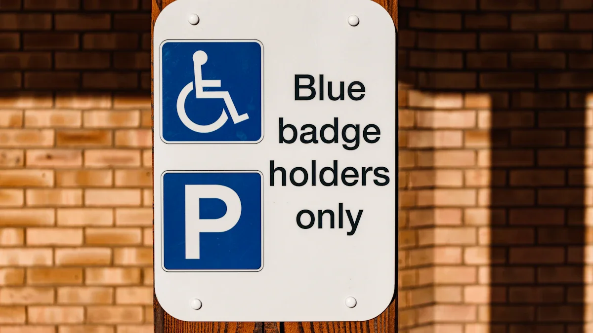 A sign on a wooden post that reads 'Blue badge holders only' with a disabled parking symbol.