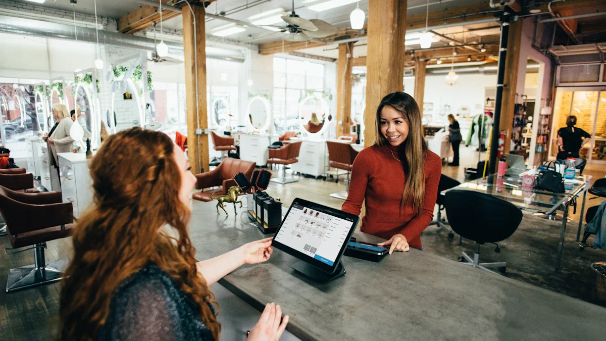 A small business owner in a hair salon serving a customer at the reception desk.