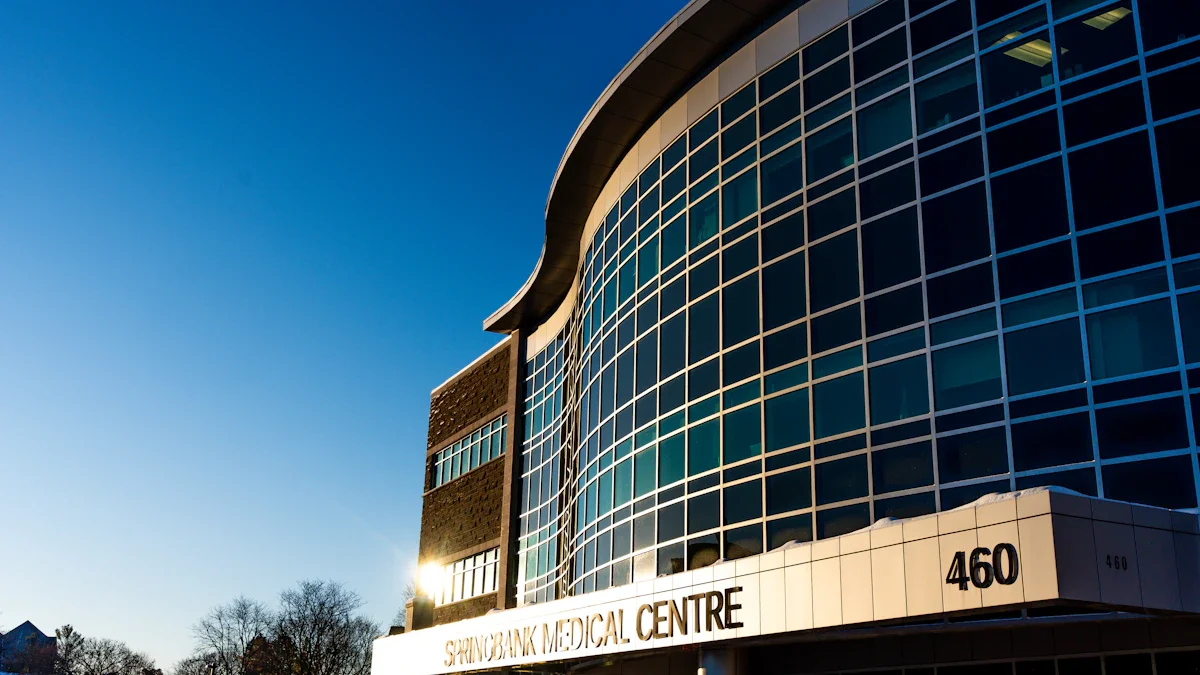 A contemporary medical facility featuring a large glass exterior and a prominent entrance canopy.
