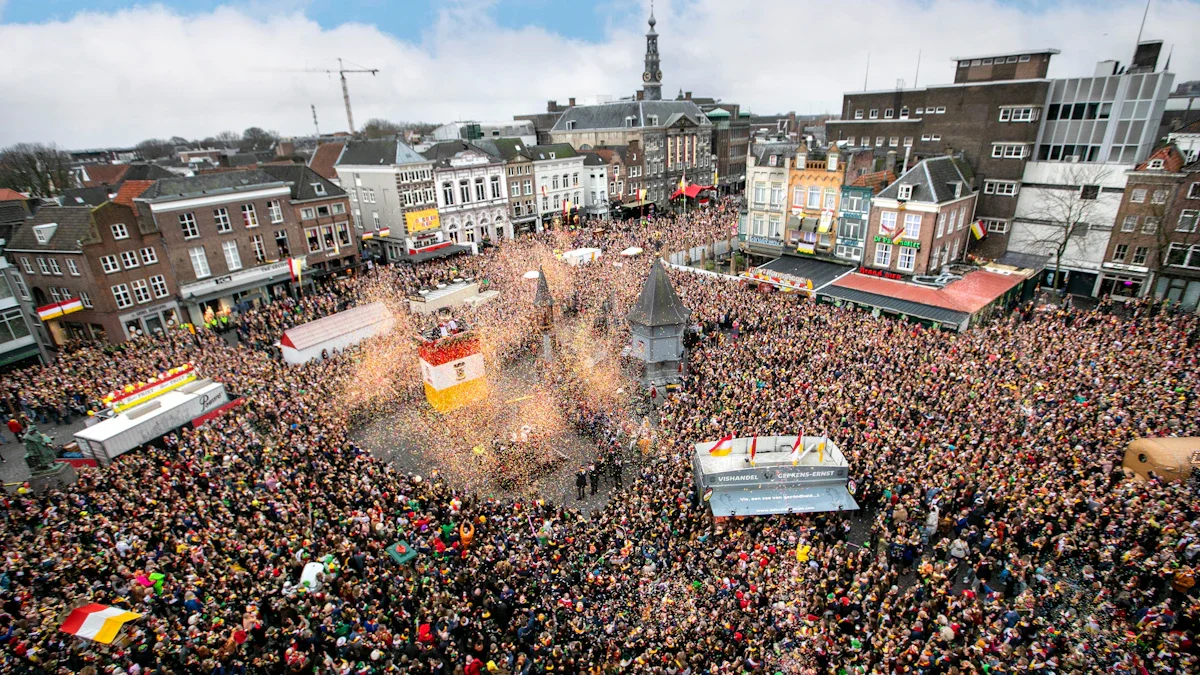 Aerial view of a crowded historic plaza filled with people celebrating a festive city parade.