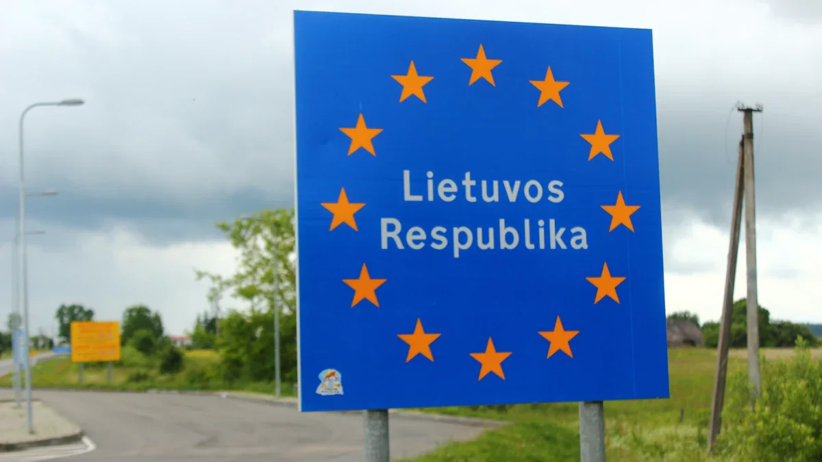 A blue road sign featuring the European Union stars and the text Lietuvos Respublika.