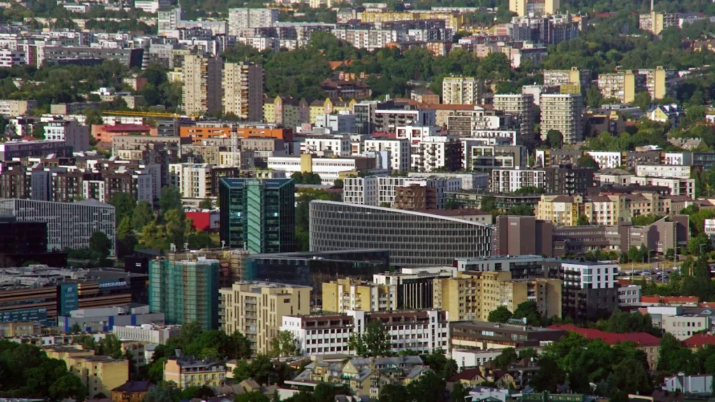 Aerial view of the modern skyline and financial district of Vilnius, Lithuania during a summer evening.