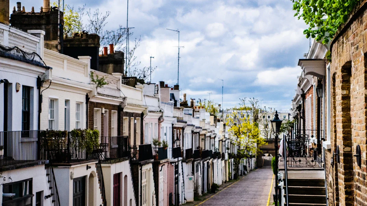 A row of traditional white and brick terraced houses on a quiet London residential street.