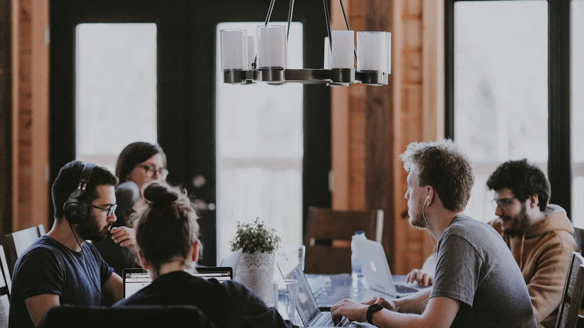 Professional team working together in a modern, collaborative office meeting space.