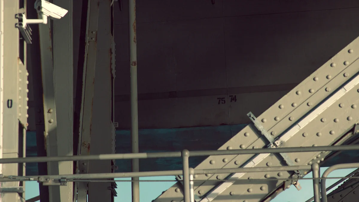 Close up of bridge security camera and industrial metal support structure.