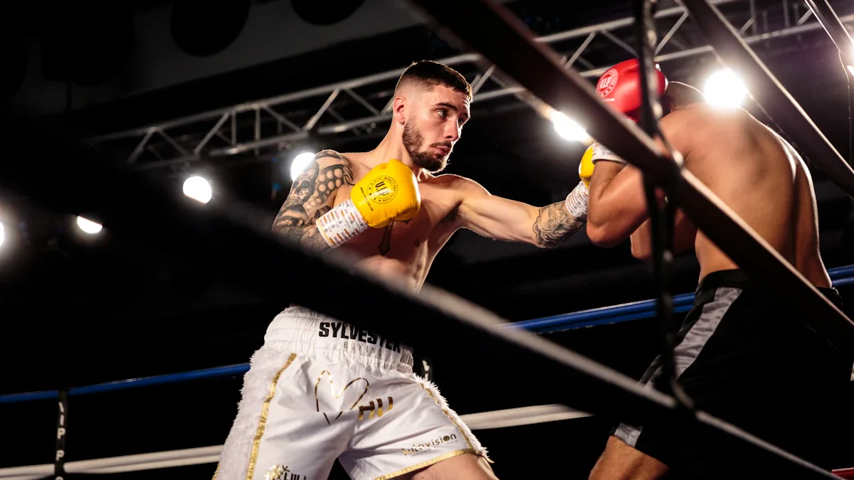 Professional kickboxer in white shorts sparring during a match in the UK